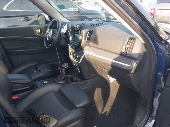 2018 MINI Countryman Cooper S z VIN WMZYT5C3XJ3E60444, wystawiony jako IAAI lot #42422793 z przebiegiem 96 722 mil mil oraz . Historia ofert i sprzedaży dostępna na DreamBid. Obrazek 5.