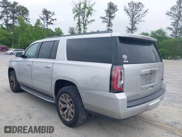 2015 GMC Yukon XL SLT with VIN 1GKS1HKC2FR251672, listed as a IAAI auction lot 42152312 with 232,736 mi miles and . Bid and sale history available at carsss.com. Image 14.