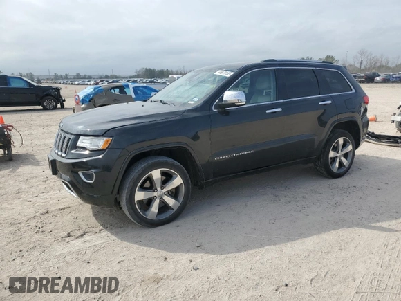2015 Jeep Grand Cherokee Overland with VIN 1C4RJFCT6FC628729, listed as a Copart auction lot 44979155 with 105,959 mi miles and Salvage Title. Bid and sale history available at DreamBid. Image 1.