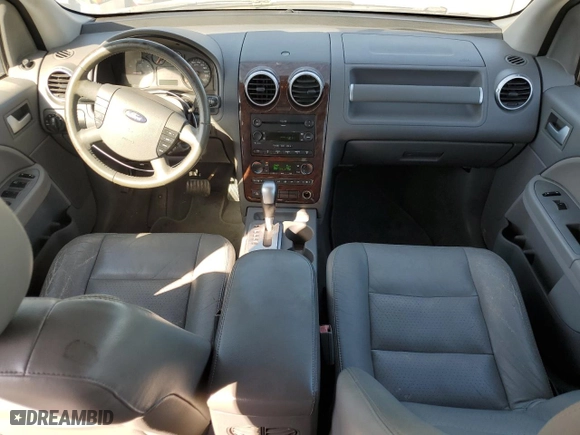 2007 Ford Freestyle SEL with VIN 1FMDK02107GA12857, listed as a Copart auction lot 74077184 with 170,267 mi miles and Clean Title. Bid and sale history available at carsss.com. Image 8.