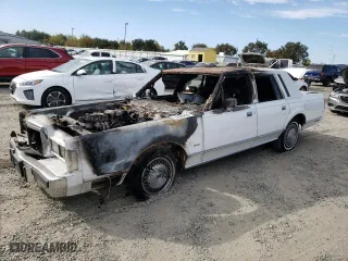 1988 Lincoln Town Car with VIN 1LNBM81F5JY730676, listed as a Copart auction lot 74849694 with 0 mi miles and Non Repairable. Bid and sale history available at carsss.com. Image 1.
