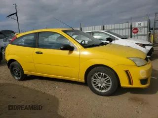 2007 Ford Focus S with VIN 1FAHP31N57W213310, listed as a Copart auction lot 43433425 with 184,433 mi miles and Salvage Title. Bid and sale history available at DreamBid. Image 4.