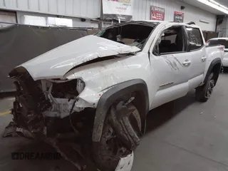 2023 Toyota Tacoma SR with VIN 3TMCZ5ANXPM652495, listed as a IAAI auction lot 42375230 with 26,736 mi miles and . Bid and sale history available at DreamBid. Image 2.