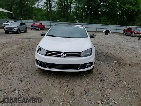 2013 Volkswagen Eos Komfort with VIN WVWBW8AH0DV003581, listed as a Copart auction lot 54498655 with 95,203 mi miles and Salvage Title. Bid and sale history available at DreamBid. Image 14.