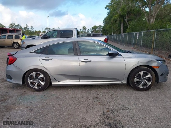 2019 Honda Civic Sedan LX with VIN 2HGFC2F62KH583213, listed as a IAAI auction lot 41935570 with 143,992 mi miles. Bid and sale history available at carsss.com. Image 14.