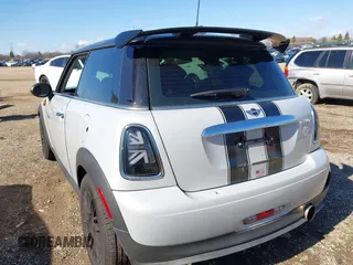 2013 MINI Cooper Hardtop with VIN WMWSU3C56DT683555, listed as a IAAI auction lot 41871323 with 102,527 mi miles. Bid and sale history available at carsss.com. Image 3.