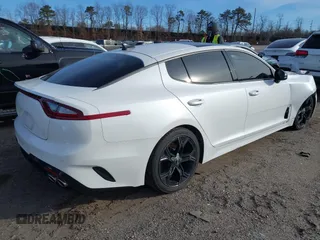 2020 Kia Stinger GT-Line with VIN KNAE15LA0L6081066, listed as a IAAI auction lot 41599142 with 73,199 mi miles. Bid and sale history available at carsss.com. Image 4.