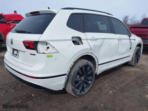 2020 Volkswagen Tiguan SE with VIN 3VV2B7AX4LM106638, listed as a IAAI auction lot 41744503 with 67,693 mi miles. Bid and sale history available at carsss.com. Image 4.