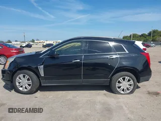 2015 Cadillac SRX with VIN 3GYFNAE33FS522380, listed as a IAAI auction lot 41641899 with 193,818 mi miles and . Bid and sale history available at DreamBid. Image 15.