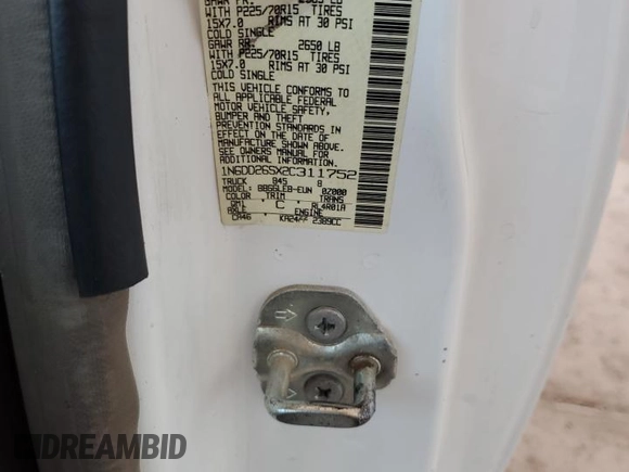 2002 Nissan Frontier XE with VIN 1N6DD26SX2C311752, listed as a Copart auction lot 61182715 with 95,746 mi miles and Salvage title. Bid and sale history available at DreamBid. Image 12.