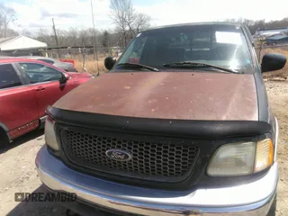 2002 Ford F-150 XLT with VIN 1FTRW08L12KC44008, listed as a IAAI auction lot 41811120 with 306,235 mi miles. Bid and sale history available at carsss.com. Image 6.
