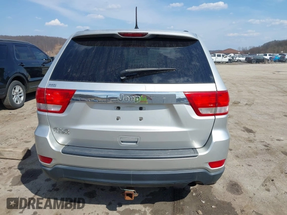 2013 Jeep Grand Cherokee Laredo with VIN 1C4RJFAG5DC634685, listed as a IAAI auction lot 41792147 with 260,594 mi miles. Bid and sale history available at carsss.com. Image 16.