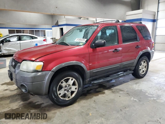 2005 Ford Escape XLT with VIN 1FMYU93115KA57475, listed as a Copart auction lot 51504325 with 165,235 mi miles and Salvage Title. Bid and sale history available at carsss.com. Image 1.
