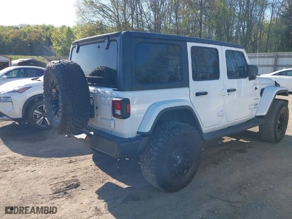 2019 Jeep Wrangler Unlimited Sahara with VIN 1C4HJXEN2KW591557, listed as a IAAI auction lot 41962034 with 88,691 mi miles. Bid and sale history available at carsss.com. Image 4.