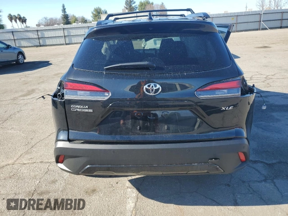 2024 Toyota Corolla Cross XLE with VIN 7MUDAAAGXRV073103, listed as a Copart auction lot 86753294 with 5,667 mi miles and Salvage title. Bid and sale history available at DreamBid. Image 6.