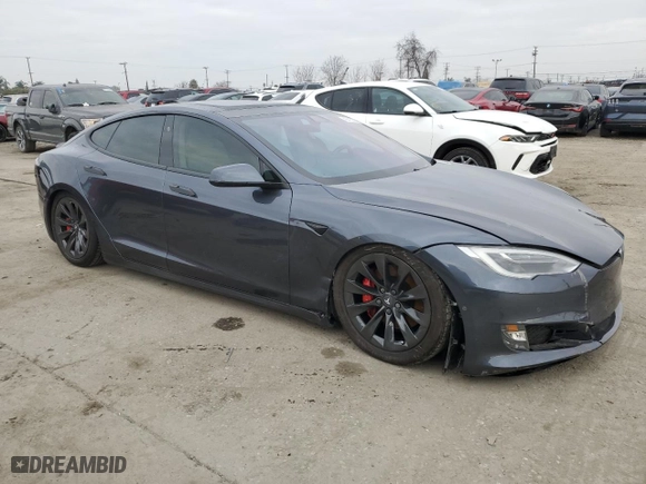 2017 Tesla Model S 100D with VIN 5YJSA1E42HF227582, listed as a Copart auction lot 43413605 with 82,531 mi miles and Salvage Title. Bid and sale history available at carsss.com. Image 4.