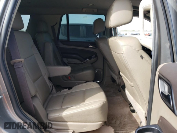 2019 Chevrolet Tahoe LT z VIN 1GNSCBKC8KR396364, wystawiony jako Copart lot #49660755 z przebiegiem 129 014 mil mil oraz Szkoda całkowita • Salvage title. Historia ofert i sprzedaży dostępna na DreamBid. Obrazek 11.