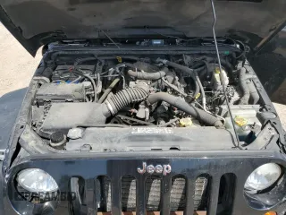 2011 Jeep Wrangler Unlimited Rubicon with VIN 1J4BA6H16BL561658, listed as a Copart auction lot 58379755 with 103,587 mi miles and Salvage title. Bid and sale history available at DreamBid. Image 11.