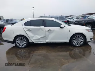 2013 Lincoln MKS with VIN 1LNHL9DK4DG605058, listed as a IAAI auction lot 41068489 with 101,801 mi miles. Bid and sale history available at carsss.com. Image 14.