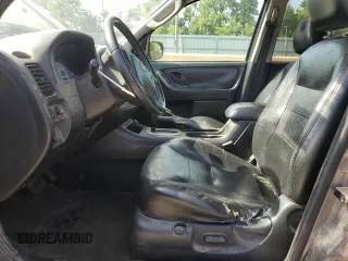 2005 Ford Escape Limited with VIN 1FMYU041X5KC72704, listed as a Copart auction lot 57819655 with 179,469 mi miles and Salvage title. Bid and sale history available at DreamBid. Image 7.