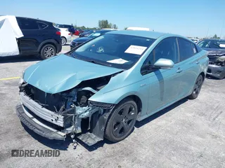 2016 Toyota Prius Four z VIN JTDKARFU0G3016597, wystawiony jako IAAI lot #42034214 z przebiegiem 125 799 mil mil oraz . Historia ofert i sprzedaży dostępna na DreamBid. Obrazek 2.