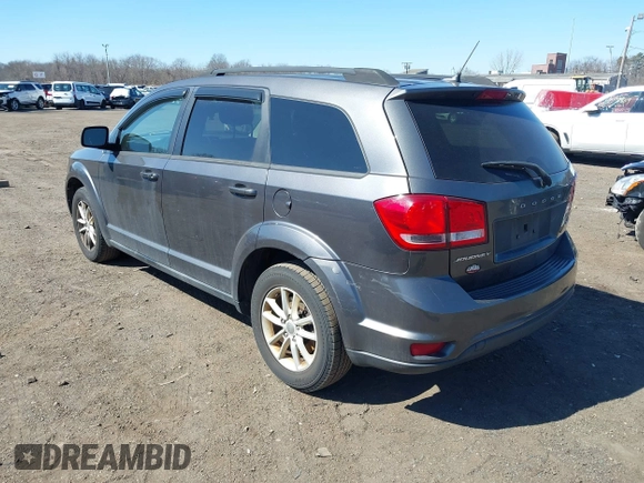 2014 Dodge Journey SXT with VIN 3C4PDCBB2ET156215, listed as a IAAI auction lot 41765840 with 129,737 mi miles and . Bid and sale history available at DreamBid. Image 3.