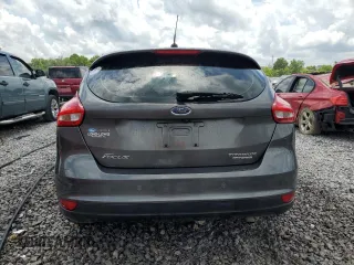 2015 Ford Focus Titanium z VIN 1FADP3N28FL239706, wystawiony jako Copart lot #62478895 z przebiegiem 143 536 mil mil oraz Szkoda całkowita • Salvage title. Historia ofert i sprzedaży dostępna na DreamBid. Obrazek 6.