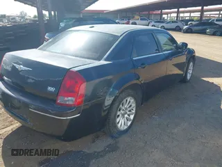 2007 Chrysler 300 Touring with VIN 2C3KA53G97H792641, listed as a IAAI auction lot 42071649 with 144,258 mi miles. Bid and sale history available at carsss.com. Image 4.