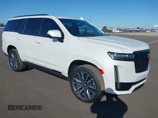 2023 Cadillac Escalade 4WD Sport z VIN 1GYS4FKL7PR286940, wystawiony jako IAAI lot #40702874 z przebiegiem 7 981 mil mil oraz . Historia ofert i sprzedaży dostępna na DreamBid. Obrazek 1.