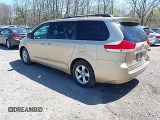 2012 Toyota Sienna LE AAS with VIN 5TDKK3DC9CS184090, listed as a IAAI auction lot 42123891 with 162,065 mi miles. Bid and sale history available at carsss.com. Image 3.