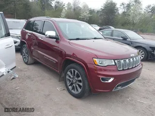 2017 Jeep Grand Cherokee Overland with VIN 1C4RJECG6HC719001, listed as a IAAI auction lot 41795517 with 103,076 mi miles. Bid and sale history available at carsss.com. Image 1.