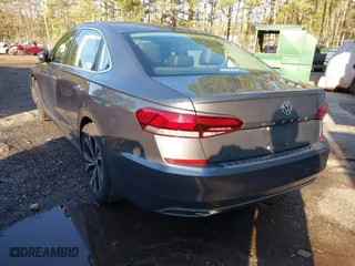 2022 Volkswagen Passat 2.0T SE with VIN 1VWSA7A38NC003707, listed as a IAAI auction lot 41853451 with 26,839 mi miles. Bid and sale history available at carsss.com. Image 3.