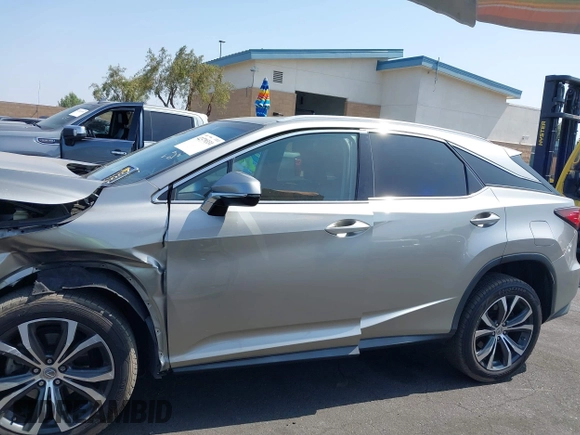 2017 Lexus RX 350 z VIN 2T2ZZMCA3HC041664, wystawiony jako IAAI lot #42379331 z przebiegiem 153 887 mil mil oraz . Historia ofert i sprzedaży dostępna na DreamBid. Obrazek 15.
