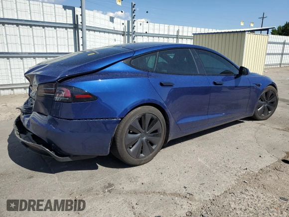 2023 Tesla Model S with VIN 5YJSA1E58PF531121, listed as a Copart auction lot 63683355 with Not provided miles and Salvage title. Bid and sale history available at DreamBid. Image 3.