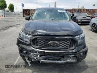 2023 Ford Ranger XL with VIN 1FTER4EH4PLE04252, listed as a Copart auction lot 58993055 with 20,307 mi miles and Salvage title. Bid and sale history available at DreamBid. Image 5.
