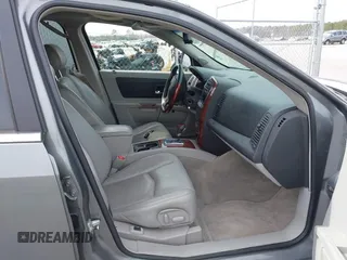 2005 Cadillac SRX with VIN 1GYEE63A550186151, listed as a IAAI auction lot 41494999 with 64,185 mi miles. Bid and sale history available at carsss.com. Image 5.