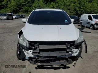 2013 Ford Escape SE z VIN 1FMCU9G99DUC73121, wystawiony jako Copart lot #57966605 z przebiegiem 169 764 mil mil oraz Szkoda całkowita • Salvage title. Historia ofert i sprzedaży dostępna na DreamBid. Obrazek 5.