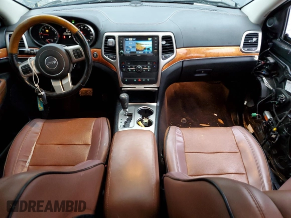 2011 Jeep Grand Cherokee Overland with VIN 1J4RS6GG5BC588562, listed as a Copart auction lot 84805424 with 150,030 mi miles and Salvage Title. Bid and sale history available at DreamBid. Image 8.