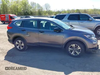 2019 Honda CR-V LX with VIN 2HKRW5H32KH410676, listed as a IAAI auction lot 42038654 with 94,342 mi miles. Bid and sale history available at carsss.com. Image 13.