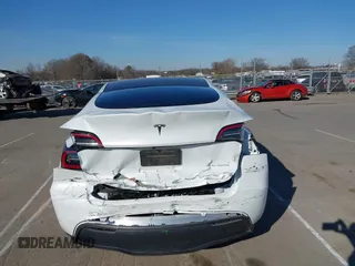2023 Tesla Model Y Long Range with VIN 7SAYGDEE5PA094253, listed as a IAAI auction lot 41701966 with 29,458 mi miles and . Bid and sale history available at DreamBid. Image 16.