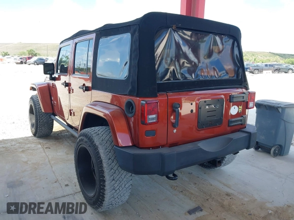 2014 Jeep Wrangler Unlimited Sahara z VIN 1C4BJWEG1EL209431, wystawiony jako IAAI lot #42325022 z przebiegiem 64 529 mil mil oraz . Historia ofert i sprzedaży dostępna na DreamBid. Obrazek 3.