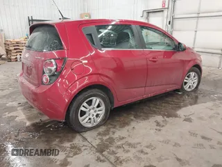 2014 Chevrolet Sonic LT with VIN 1G1JC6SHXE4212589, listed as a IAAI auction lot 41622549 with 63,135 mi miles. Bid and sale history available at carsss.com. Image 4.