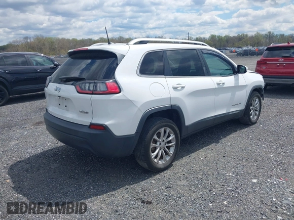 2019 Jeep Cherokee Latitude with VIN 1C4PJLCB4KD366405, listed as a IAAI auction lot 42018976 with 58,626 mi miles. Bid and sale history available at carsss.com. Image 4.