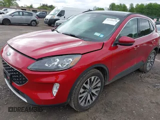 2020 Ford Escape Titanium with VIN 1FMCU9J99LUB28104, listed as a IAAI auction lot 42295278 with 73,706 mi miles and . Bid and sale history available at DreamBid. Image 18.