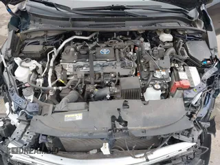2023 Toyota Corolla Hybrid LE with VIN JTDBCMFE8PJ003081, listed as a IAAI auction lot 41041004 with 19,146 mi miles. Bid and sale history available at carsss.com. Image 10.