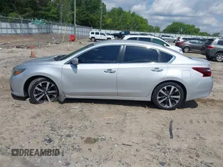 2017 Nissan Altima SR z VIN 1N4AL3AP8HC257299, wystawiony jako IAAI lot #42312909 z przebiegiem 50 154 mil mil oraz . Historia ofert i sprzedaży dostępna na DreamBid. Obrazek 14.