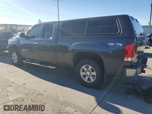 2010 GMC Sierra 1500 with VIN 1GTYKWE25AZ287603, listed as a Copart auction lot 79926284 with 122,683 mi miles and Salvage Title. Bid and sale history available at DreamBid. Image 2.