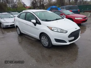 2014 Ford Fiesta S z VIN 3FADP4AJ6EM195270, wystawiony jako IAAI lot #42020539 z przebiegiem 171 261 mil mil oraz . Historia ofert i sprzedaży dostępna na DreamBid. Obrazek 1.
