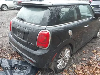 2019 MINI Hardtop Cooper S z VIN WMWXP7C54K2A53043, wystawiony jako IAAI lot #41794566 z przebiegiem 42 278 mil mil oraz . Historia ofert i sprzedaży dostępna na DreamBid. Obrazek 20.