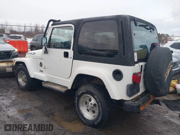 1997 Jeep Wrangler Sahara with VIN 1J4FY49S1VP503639, listed as a IAAI auction lot 41708134 with 102,196 mi miles and . Bid and sale history available at carsss.com. Image 3.
